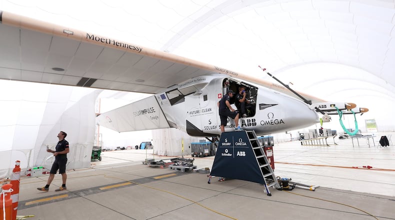 Over 50 people make up the crew that maintains the Solar Impulse 2, a solar- powered aircraft on a historic flight around the world. The plane landed in Dayton Saturday night and is scheduled to take off for New York this morning and then head to either Europe or North Africa. LISA POWELL /STAFF