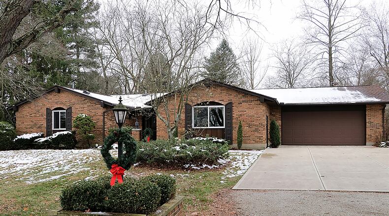 The 4-bedroom ranch has about 2,430 sq. ft. of living space. An addition made to the original floor plan opened up socials areas and installed large windows to bring a little bit of the country inside. The house sits well off the road with a long driveway and extra side parking pad. CONTRIBUTED PHOTO BY KATHY TYLER
