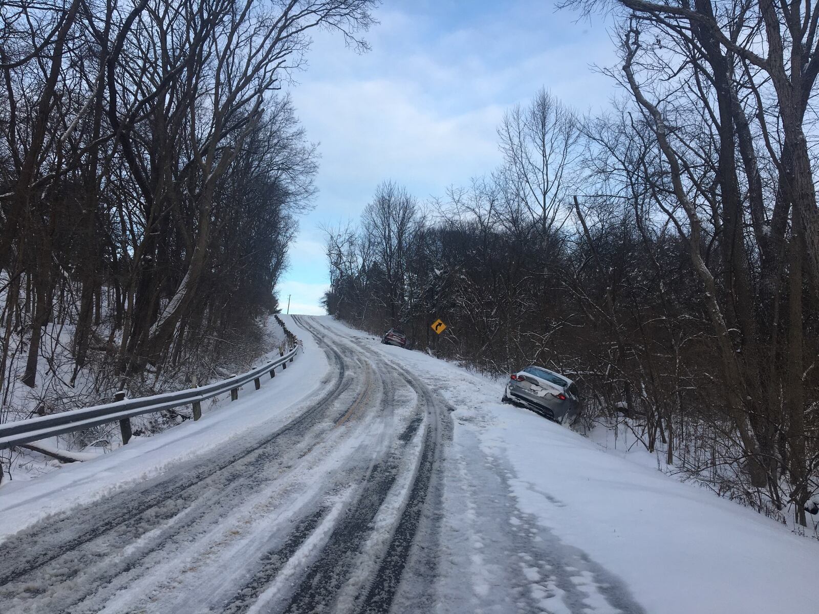 Deputies blocked a portion of Brush Row Road between Stevenson and Mason roads in Greene County due to several slide-offs.  (Noah Fickert/Staff)