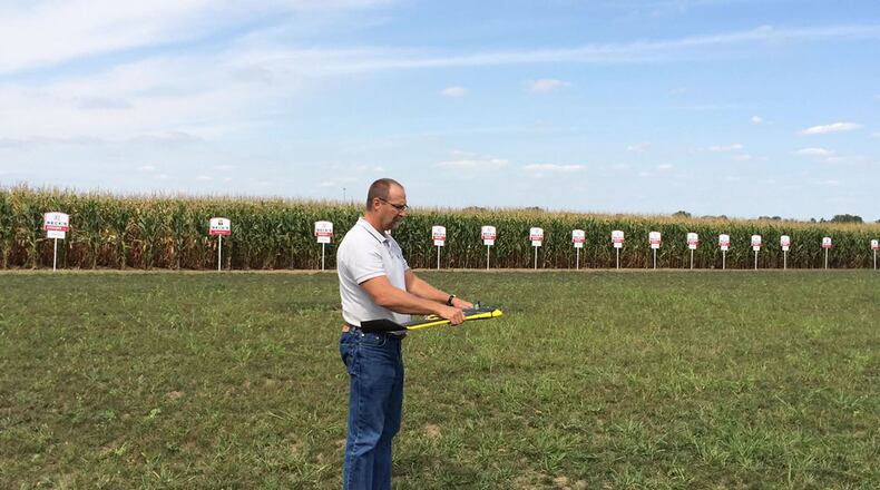 Joe Diemunsch, a computer engineer with Air Force Research Laboratory and the first person to enter AFRL’s Entrepreneurial Opportunities Program, prepares to launch a remotely piloted aircraft over a field of corn. Diemunsch is exploring the possibility of commercializing a tool that would be used with data received from sensors aboard a remotely piloted aircraft to help farmers with more precise information about nutrient deficiencies, disease, pest damage and weeds. (Air Force photo)