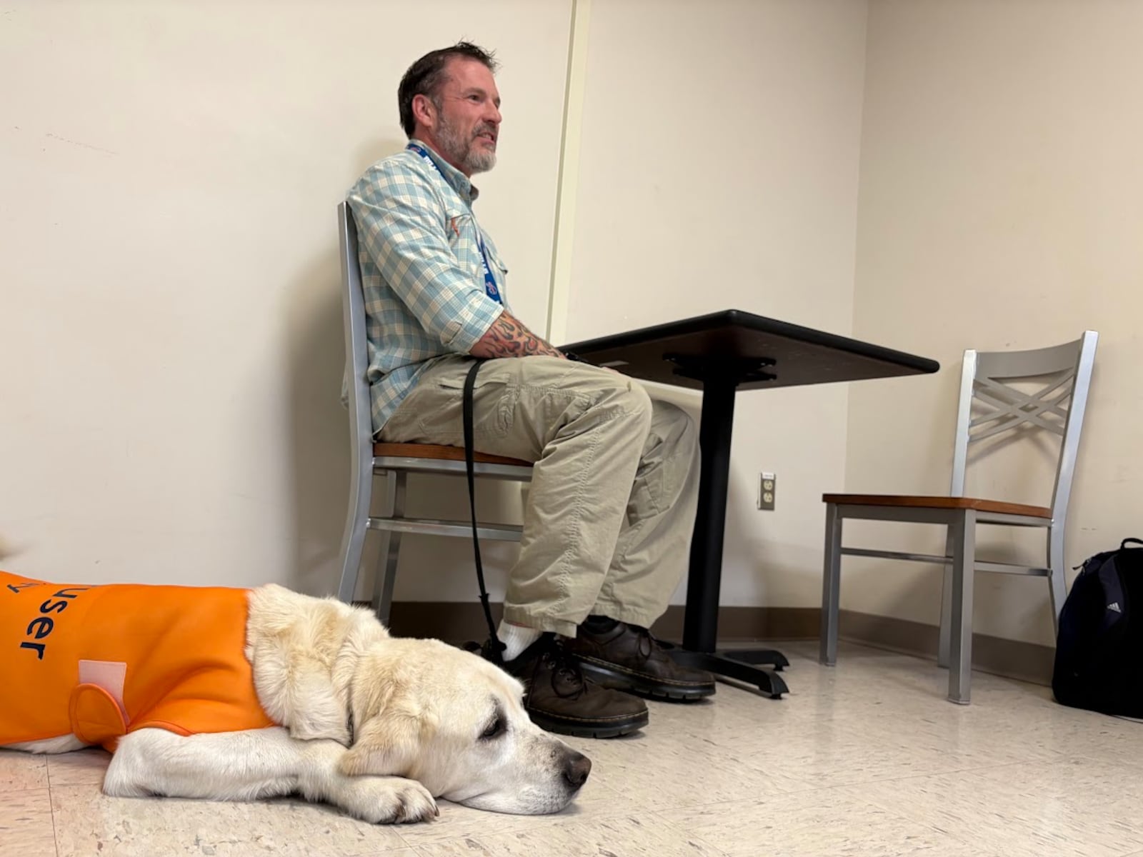 Meet Snaxs, also known as Korey, a Golden Labrador service dog for VA health informatics specialist Joel Legawiec. Snaxs is beloved of everyone he encounters at the Dayton VA Medical Center. THOMAS GNAU/STAFF