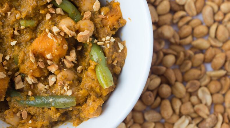 African sweet potato-peanut stew is garnished with chopped peanuts on Wednesday, Feb. 28, 2018 in St. Louis, Mo. (Austin Steele/St. Louis Post-Dispatch/TNS)