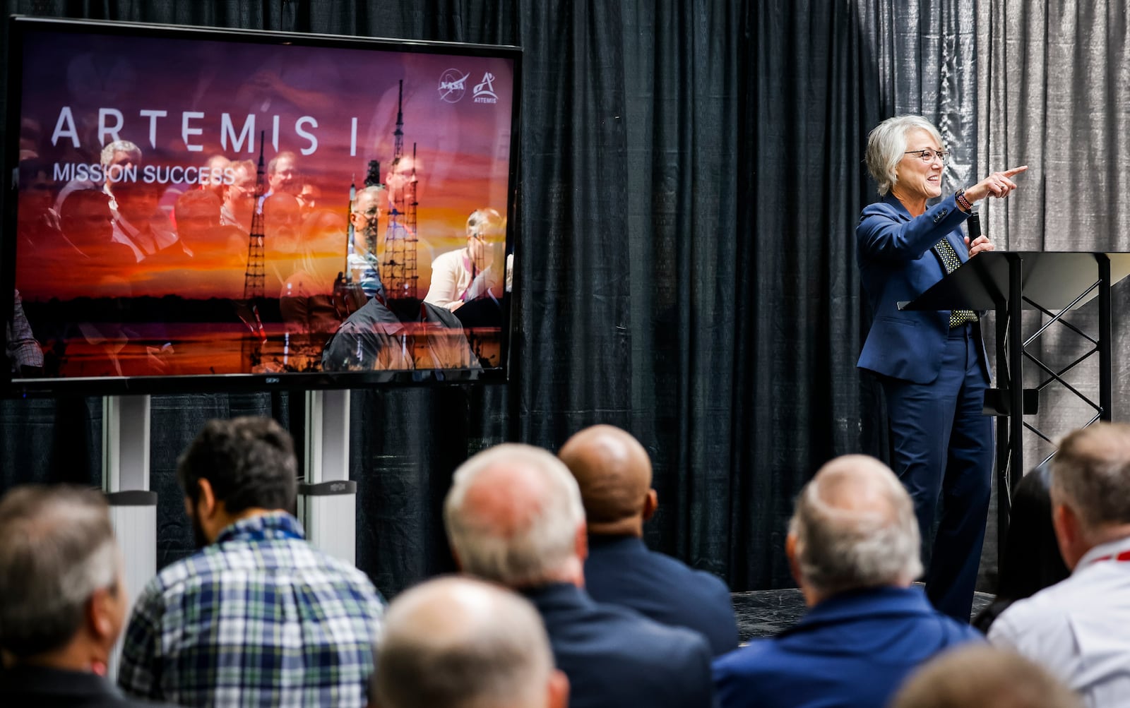 Marcia Lindstrom, Strategic Communications Manager for NASA, speaks to a group at L3Harris about their part in the Artemis 1 project during an event Wednesday, Aug. 16, 2023 at L3Harris in Mason. NICK GRAHAM/STAFF