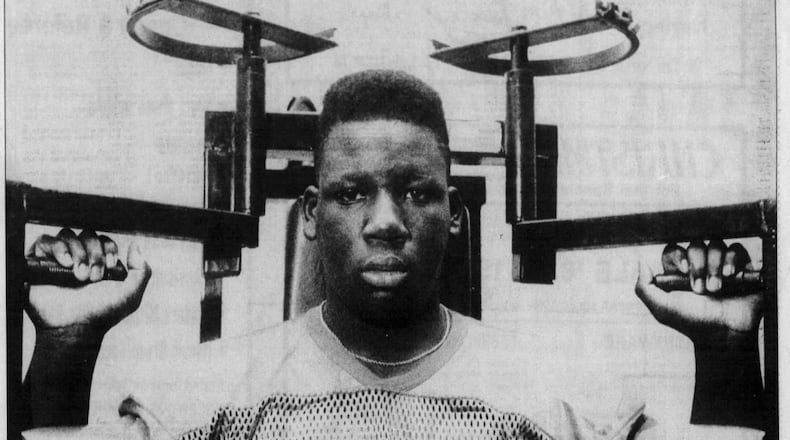 Dan Wilkinson jumped on the football scene as a 15-year-old sophomore at Dunbar high school. At that point he was already a 6-foot-3-inch, 300-pound starter on the varsity. DAYTON DAILY NEWS ARCHIVES