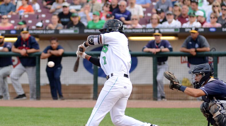 Dayton’s Jeter Downs gets the winning hit in the ninth inning of the Dragons game Wednesday at Fifth Third Field. Brian Swartz/CONTRIBUTED