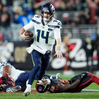 Seattle Seahawks quarterback Sam Darnold (14) runs against the San Francisco 49ers during the first half of an NFL football game in Santa Clara, Calif., Saturday, Jan. 3, 2026. (AP Photo/Godofredo A. Vásquez)