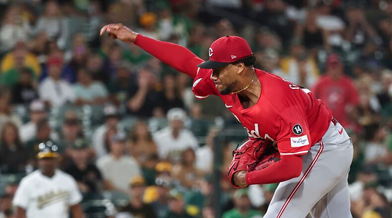 Cincinnati Reds pitcher Hunter Greene throws to the Athletics during the third inning of a baseball game Saturday, Sept. 13, 2025, in West Sacramento, Calif. (AP Photo/Sara Nevis)