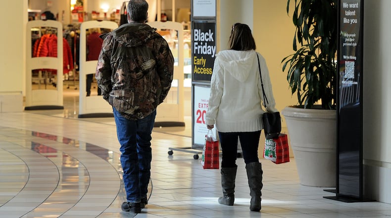Shoppers looking for good deals at the Dayton Mall Monday, Nov. 22, 2021. MARSHALL GORBY\STAFF