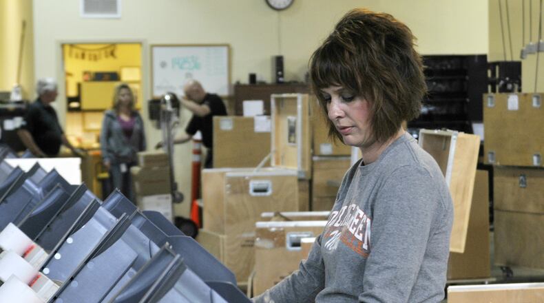 Poll workers are paid $165 and must attend a three-hour training class, a one-hour meeting on the eve of the election, and work all day Election Day. MICHAEL D. PITMAN/STAFF