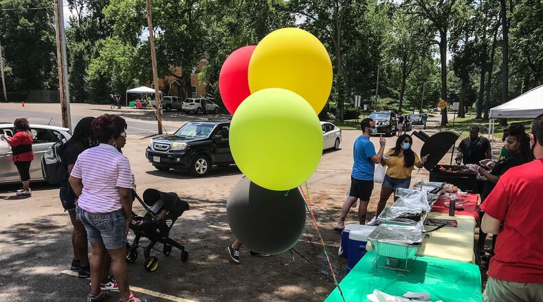 DECA Prep held a drive-through Juneteenth celebration at the school on Homewood Avenue in Dayton in 2020. Deaunna Watson organized the event and said family and community were invited to the COVID-19 aware event. JIM NOELKER/STAFF