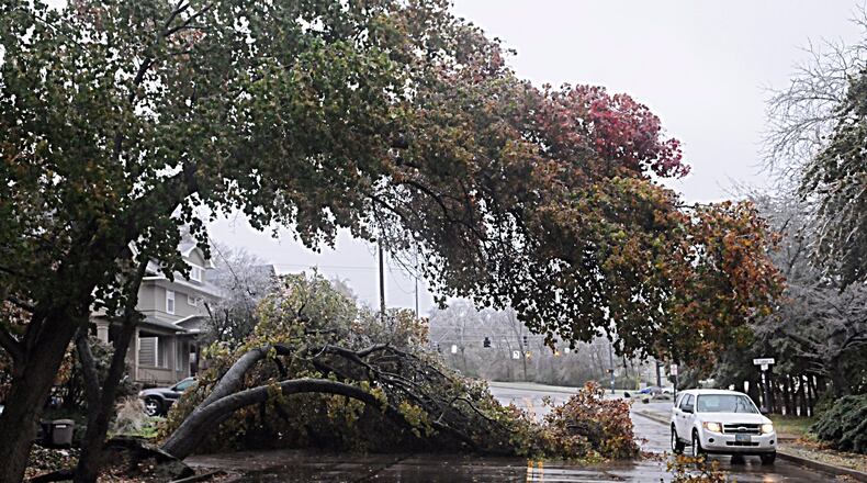The after effects of November’s ice storm and late falling leaves are still being felt in Kettering. The city’s annual residential leaf collection service was due to be complete the first week of December, but has been extended through December 21. Power crews are working around the clock, according to DP&L officials, to restore power to those remaining without electricity. Repair in the widespread area affected by the ice storm is expected to take several days. These trees were bent and broken along East Schantz Avenue from the weight of the ice. MARSHALL GORBY / STAFF