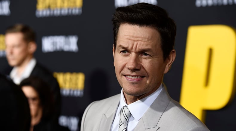 Mark Wahlberg, star of the Netflix film "Spenser Confidential," poses at the premiere of the film at the Regency Village Theatre, Thursday, Feb. 27, 2020, in Los Angeles.