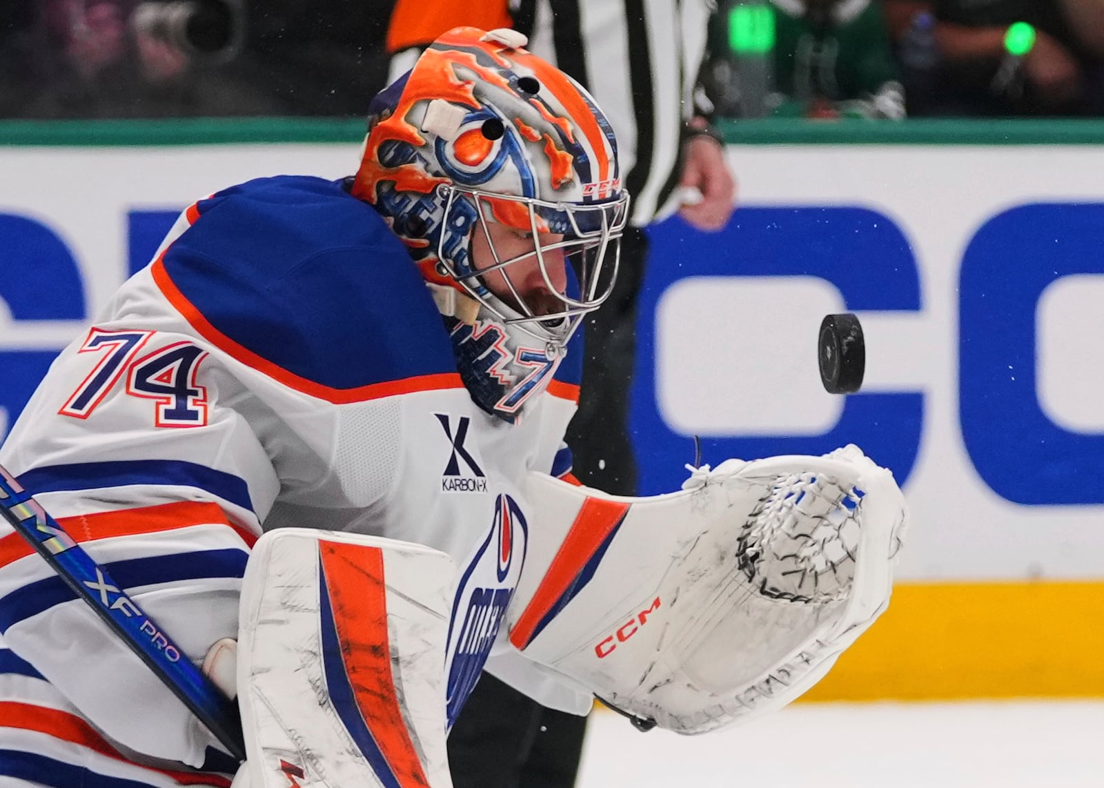 Edmonton Oilers goaltender Stuart Skinner stops a shot against the Dallas Stars during the first period of Game 5 of the Western Conference finals in the NHL hockey Stanley Cup playoffs, Thursday, May 29, 2025, in Dallas. (AP Photo/Julio Cortez)