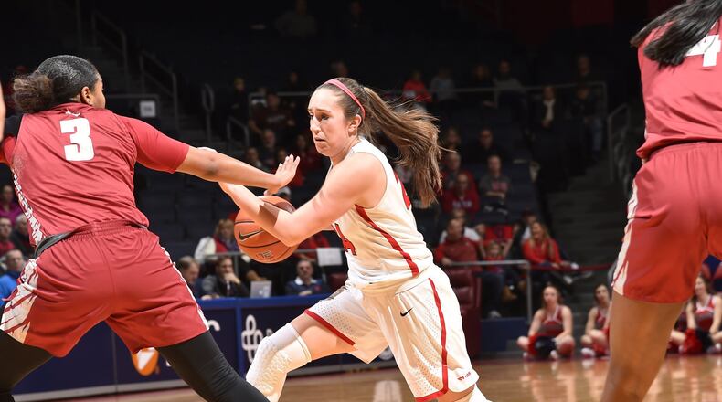 Dayton’s Lauren Cannatelli drives against St. Joseph’s during Sunday’s game at UD Arena. Cannatelli set several school records by making 22 of 22 free-throw attempts in the Flyers’ win. Erik Schelkun/CONTRIBUTED