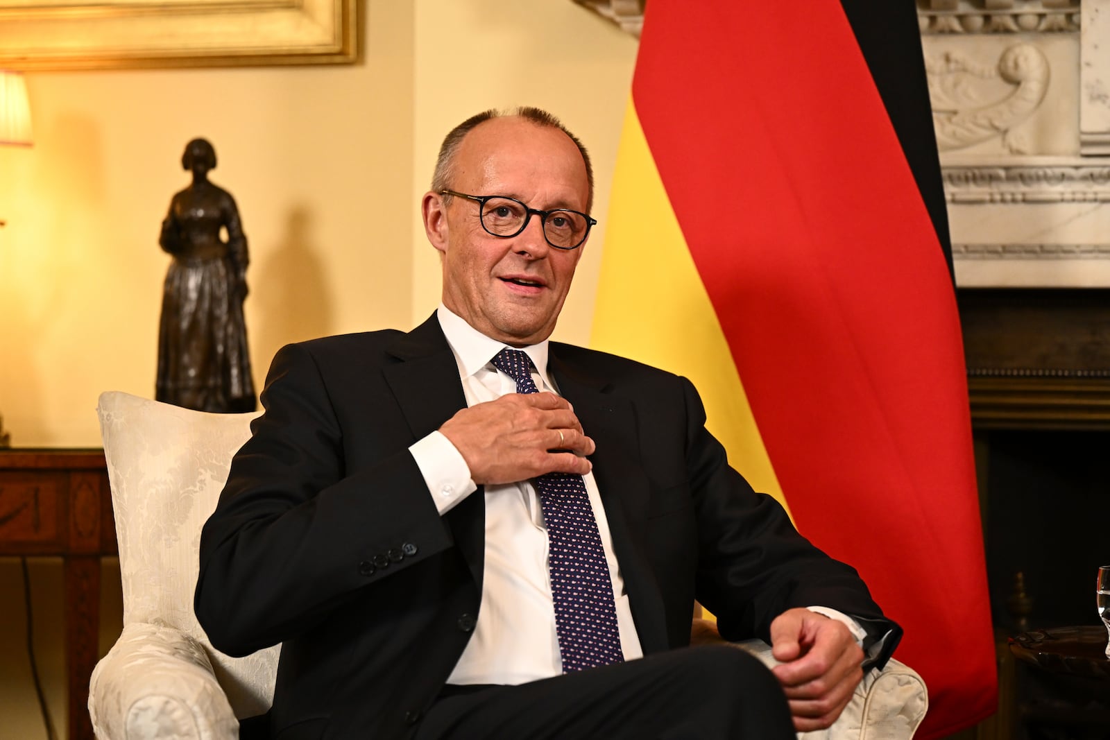 German Chancellor Friedrich Merz, sits, during a meeting with Britain's Prime Minister Keir Starmer at 10 Downing Street in London, Thursday, July 17, 2025. (Leon Neal, Pool Photo via AP)