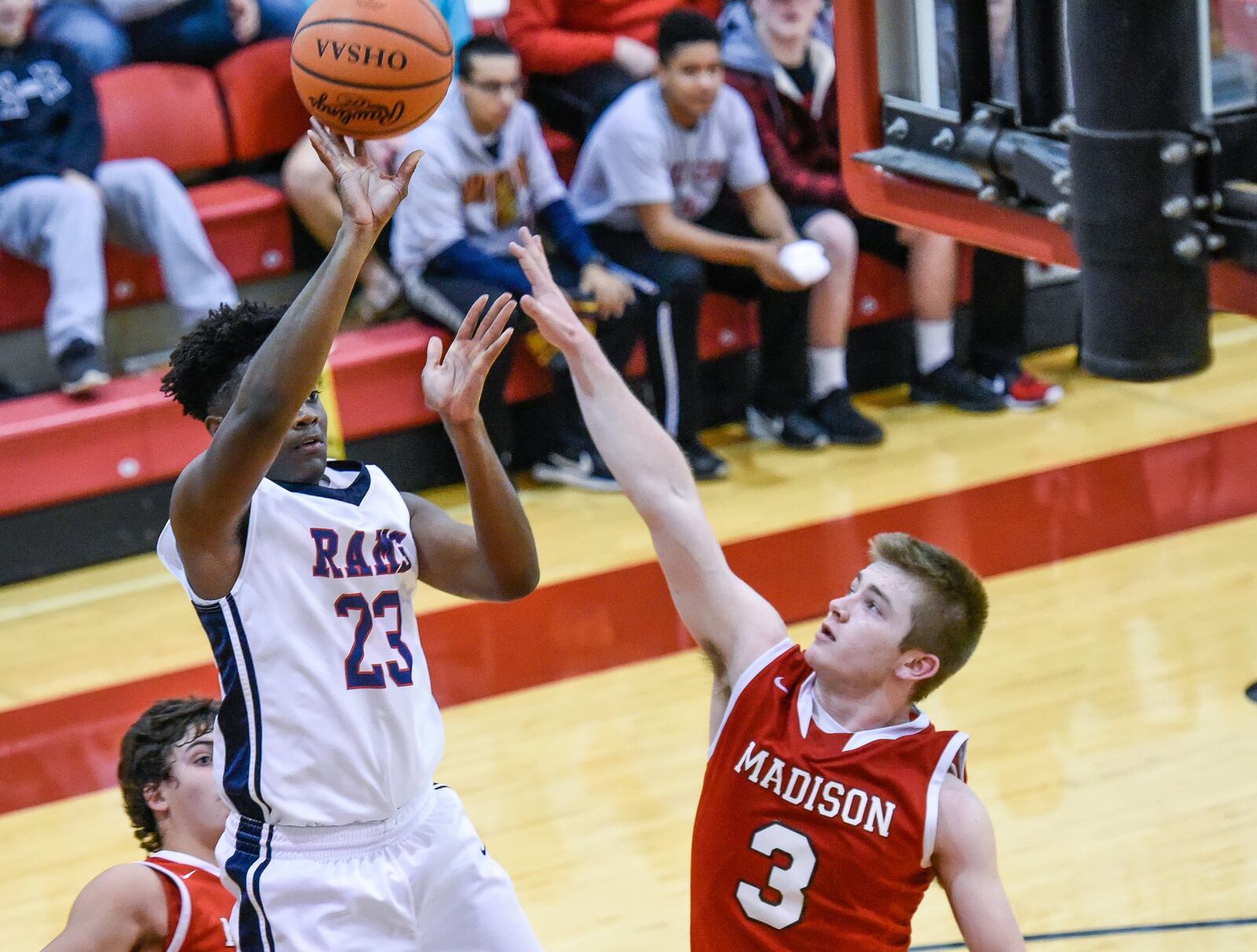 Madison’s Mason Whiteman (3) can’t quite block the shot of Miami Valley’s Lennox Roberts on Thursday night during the Brian Cook Classic at Madison. NICK GRAHAM/STAFF