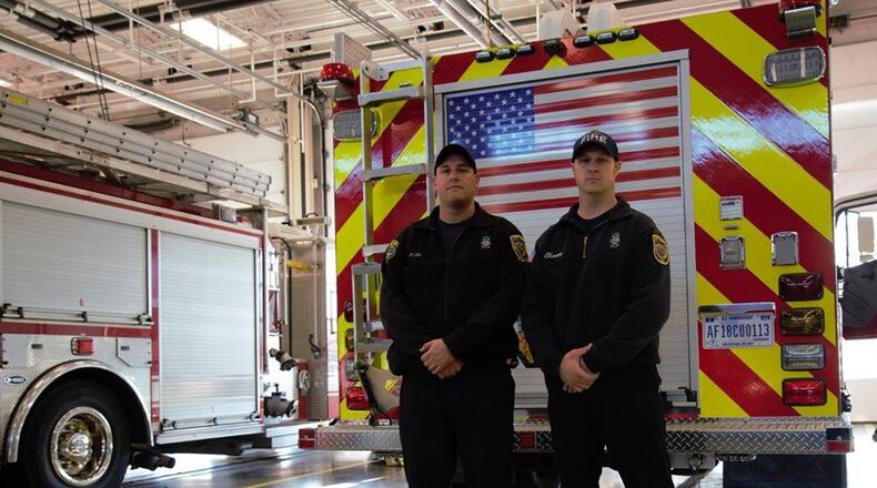 Firefighters Andrew Ohls (left), and Aron Chaney on duty at Fire Station 1. (U.S. Air Force photo/John Van Winkle)