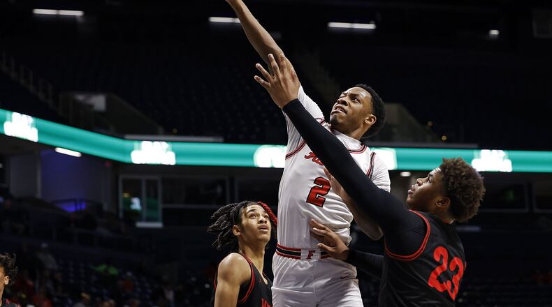 Fairfield's Deshawne Crim goes to the hoop defended by Wayne's Juan Cranford Jr. during their Division I regional basketball game Wednesday, March 9, 2022 at Cintas Center on the Xavier University campus in Cincinnati. Fairfield won 51-42. NICK GRAHAM/STAFF