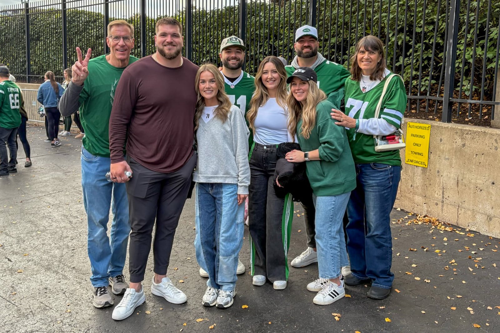 New York Jets center and Miamisburg grad Josh Myers and his family pose for a photo outside of Paycor Stadium after Jets 39-38 victory on Sunday, Oct. 26 in Cincinnati. TOM ARCHDEACON / CONTRIBUTED PHOTO