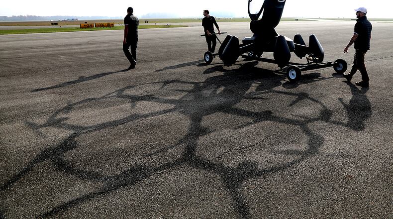 The Lift Aircraft crew prepares to demonstrate their advanced air mobility system, or flying car, during the Advanced Air Mobility Showcase at Springfield-Beckley Municipal Airport late last year. The event featured some of the top companies in the world of advanced air mobility systems as they showed their flying vehicles and the technology that makes them possible. BILL LACKEY/STAFF