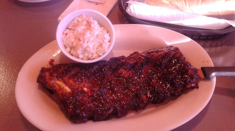 The sauce on Bolts’ Half-rack Pork Ribs is sweet and perfectly slathered, the ribs tender and delicious. SANDY COLLINS/STAFF