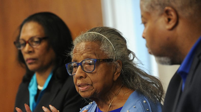 Helen Dewberry, center, talks at a NAACP press conference Monday, Jan. 22, 2024, about how she felt she was treated unjustly at the Sleep Number store in Miami Twp. MARSHALL GORBY/STAFF