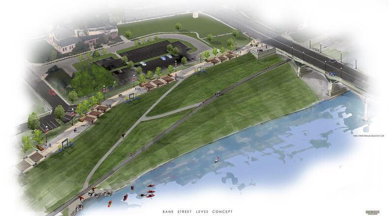 Workers on Monday began reshaping a downtown levee in a project that will include a new ramp down the west bank of the Great Miami River. The flattened levee and concrete ramp will allow pedestrians and bicyclists easier access to the Great Miami River Trail and provide a safer place for kayakers to safely exit the water, said Kurt Rinehart, chief engineer for the Miami Conservancy District. SUBMITTED