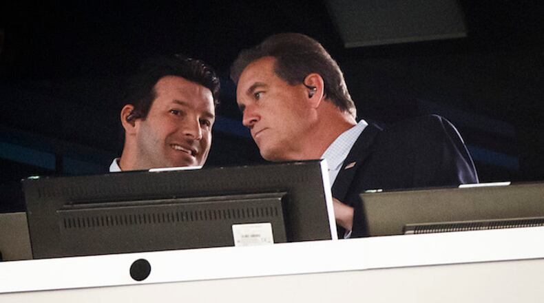 Tony Romo (left) works in the broadcast booth with Jim Nantz during the first half of an NFL football game between the Dallas Cowboys and the Los Angeles Chargers on Thursday, Nov. 23, 2017 at AT&T Stadium in Arlington, Texas. (Smiley N. Pool/Dallas Morning News/TNS)