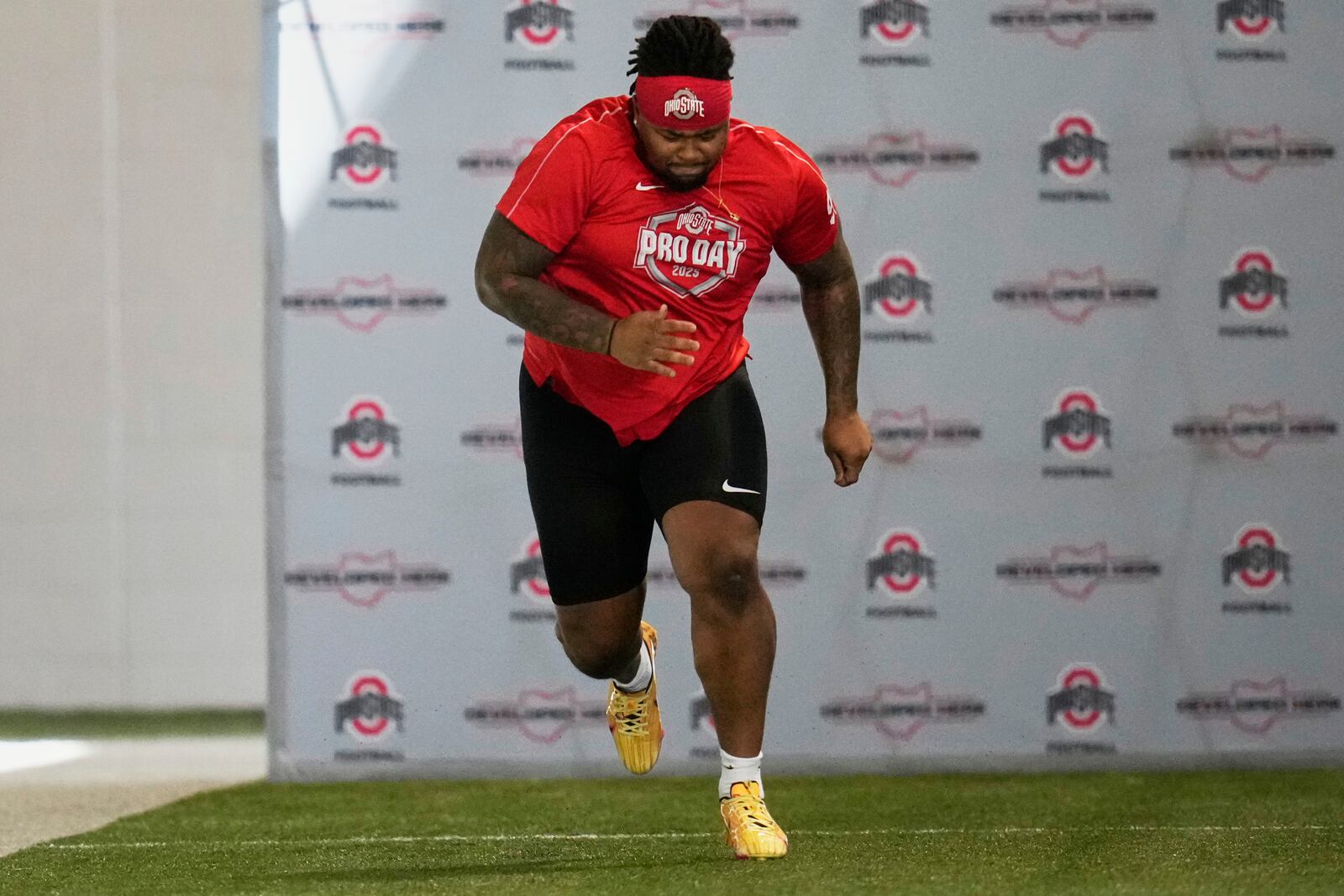Ohio State's Tyleik Williams runs the 40-yard dash during the school's NFL football pro day, Wednesday, March 26, 2025, in Columbus, Ohio. (AP Photo/Sue Ogrocki)