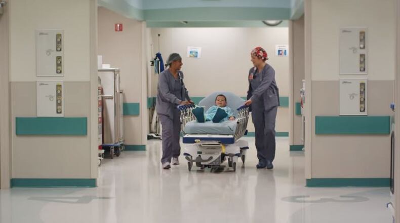 A Dayton Children’s patient is pictured in the commercial the hospital ran locally during the Super Bowl. CONTRIBUTED