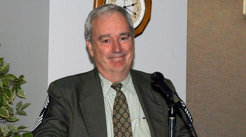 Bill Grimes, former Big Safari Director and retired Air Force colonel, prepares to speak after a ceremony to make him an honorary chief master sergeant shortly after his retirement as an active-duty colonel. The honor is the highest tribute chief master sergeants can bestow on a leader. Grimes was always proud of his chief’s stripes, and they hung in his home office until his passing, according to long-time colleague Kim High. (Courtesy photo)