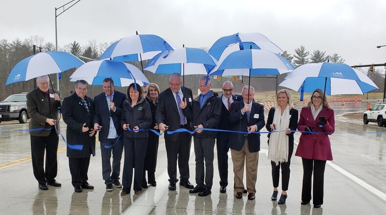 A new $40 million full-access interchange system opening today along Interstate 71 in Warren County is aimed at increasing economic growth and providing easier access for area businesses and residents. NICK GRAHAM / STAFF