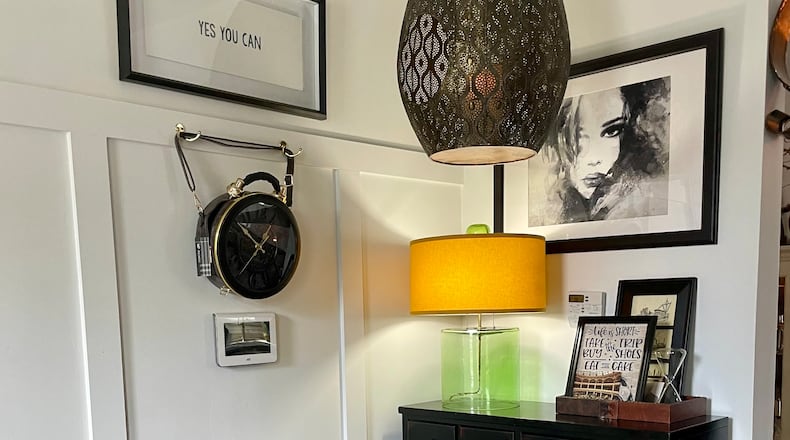 A corner of the living room features a print (right) from IKEA. Photo by Robin McMacken