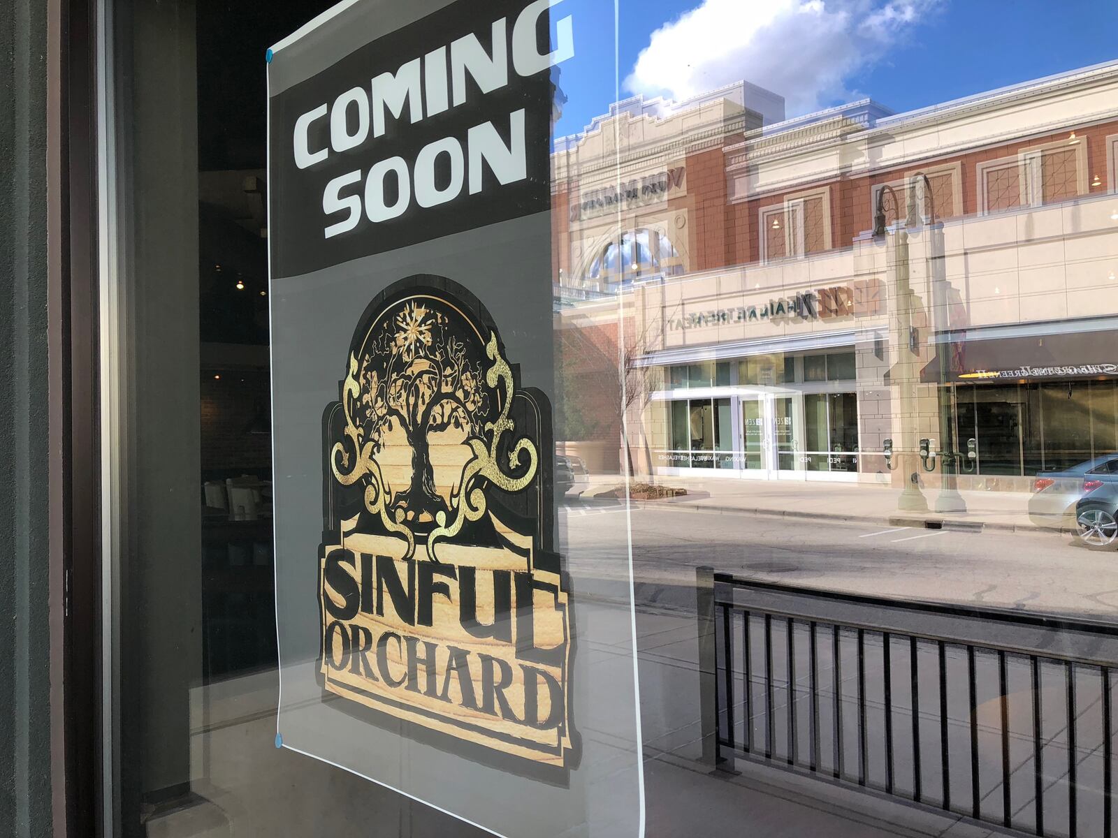 Sinful Orchard has posted signs in the space that will be a new restaurant in the east side of The Greene Town Center. MARK FISHER/STAFF