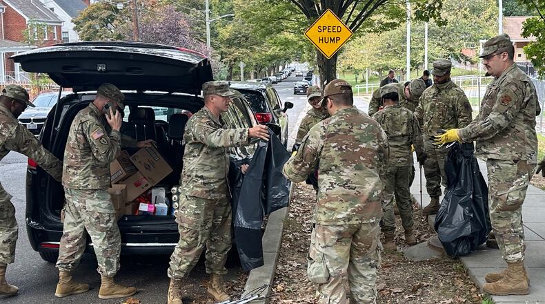 D.C. National Guard members clean up the park around Fort Stevens Recreation Center, Saturday, Oct. 11, 2025, in Washington. News of the cleanup sparked a community debate over the presence of the Guard. (AP Photo/Gary Fields)