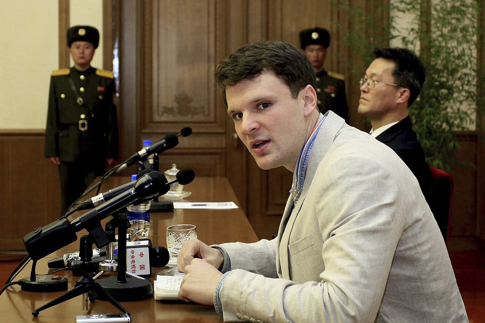FILE - In this Feb. 29, 2016 file photo, American student Otto Warmbier speaks to reporters in Pyongyang, North Korea. Secretary of State Tillerson said Tuesday, June 13, 2017, that North Korea released the jailed U.S. university student (AP Photo/Kim Kwang Hyon, File)