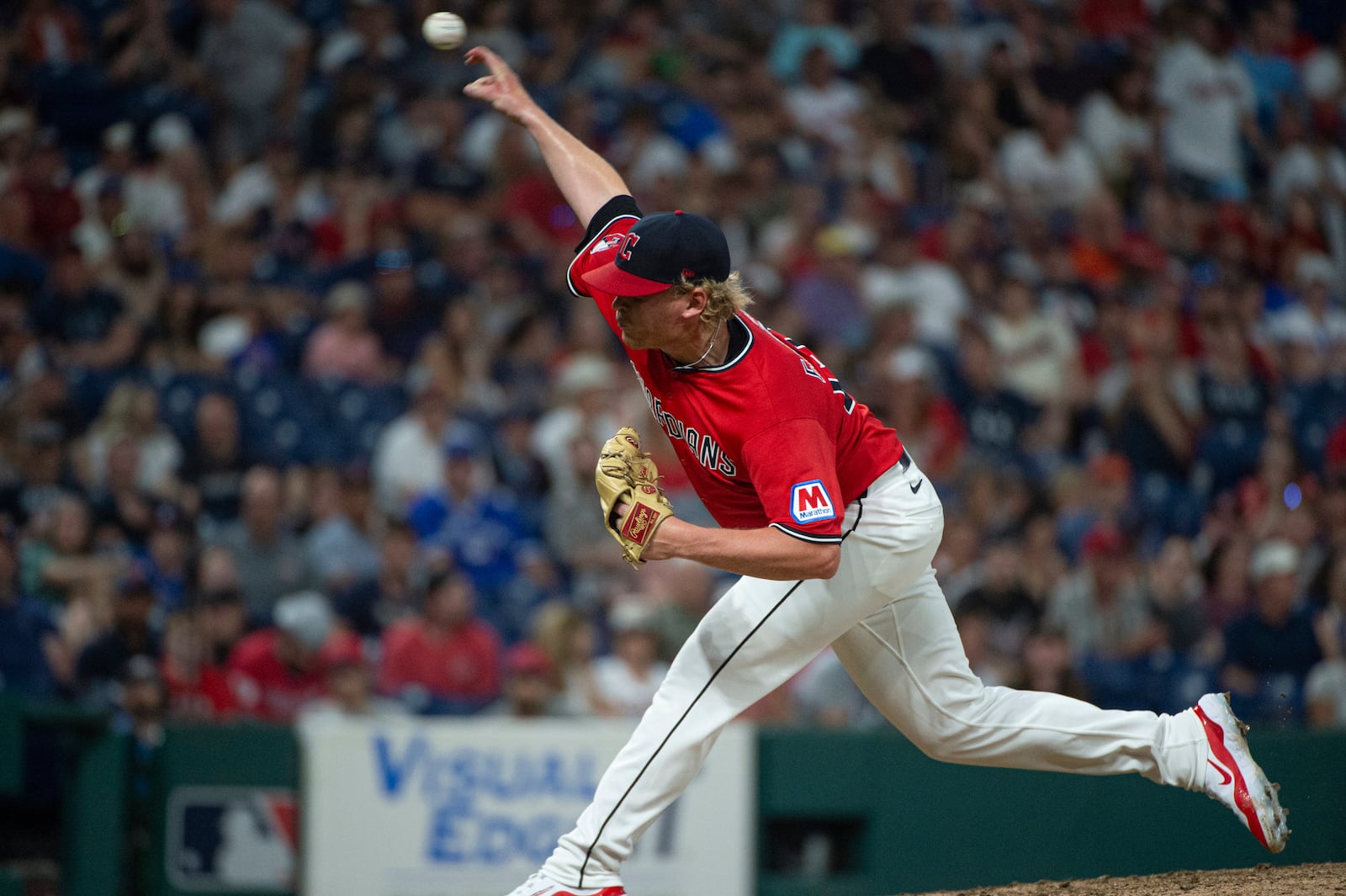 Cleveland Guardians relief pitcher Nic Enright delivers against the Toronto Blue Jays during the 10th inning of a baseball game, Wednesday, June 25, 2025, in Cleveland. (AP Photo/Phil Long)