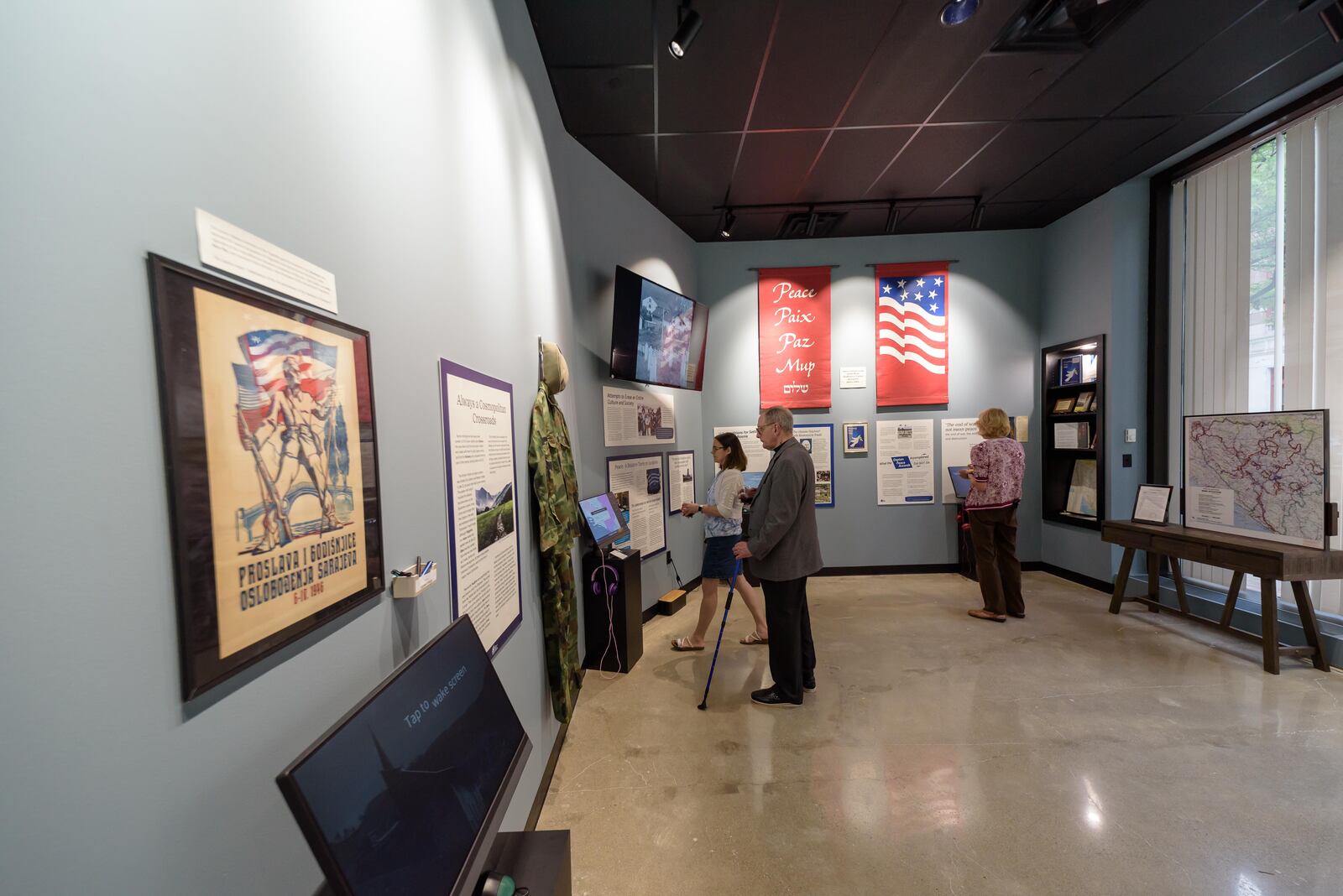 The International Peace Museum celebrated its grand reopening on Thursday, June 2, 2022 after moving from the Isaac Pollack House at 208 W. Monument Ave. to a newly renovated space at 10 N. Ludlow St on Courthouse Square in downtown Dayton. Photographer Bernard Kleina, the event’s featured guest addressed attendees about his exhibit “The Chicago Freedom Movement”, a collection of rare color photographs of Dr. Martin Luther King Jr. taken in Chicago in the summer of 1966 featuring Dr. King’s freedom marches in all-white neighborhoods to bring awareness of “fair housing.” The exhibit will continue through Saturday, July 30. TOM GILLIAM / CONTRIBUTING PHOTOGRAPHER