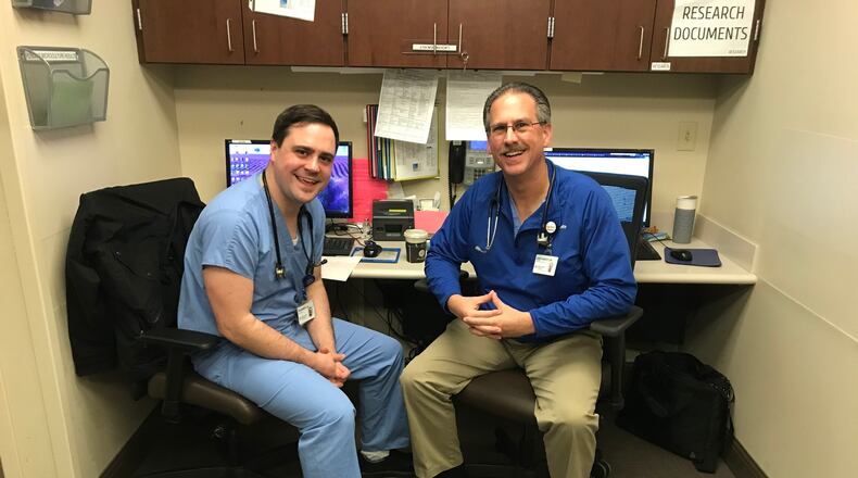 Dr. Rick Marriott and his father, Dr. Randy Marriott, are both part of Miami Valley Emergency Specialists, which contracts to provide emergency room doctors to all Premier Health hospitals. CONTRIBUTED