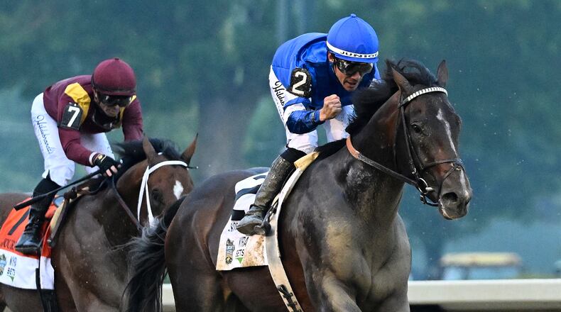 FILE - Jockey Junior Alvarado reacts aboard Sovereignty (2), as he crosses the finish line aboard Sovereignty (2) ahead of Journalism (7), with jockey Umberto Rispoli up, to win the 157th running of the Belmont Stakes horse race, Saturday, June 7, 2025, in Saratoga Springs, N.Y. (AP Photo/Jessica Hill, file)
