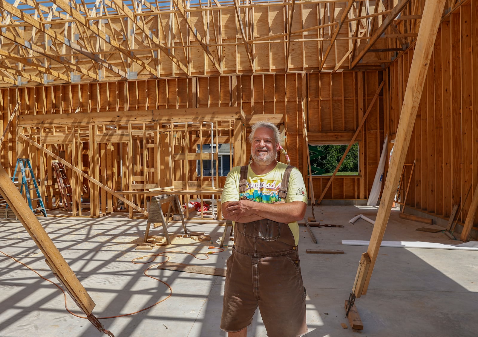 Jon Vanderglas poses for a portrait inside his upcoming taproom New Enon Brewing on Wednesday, July 23, 2025, in Enon. Construction on the building finishes in October. JOSEPH COOKE/STAFF