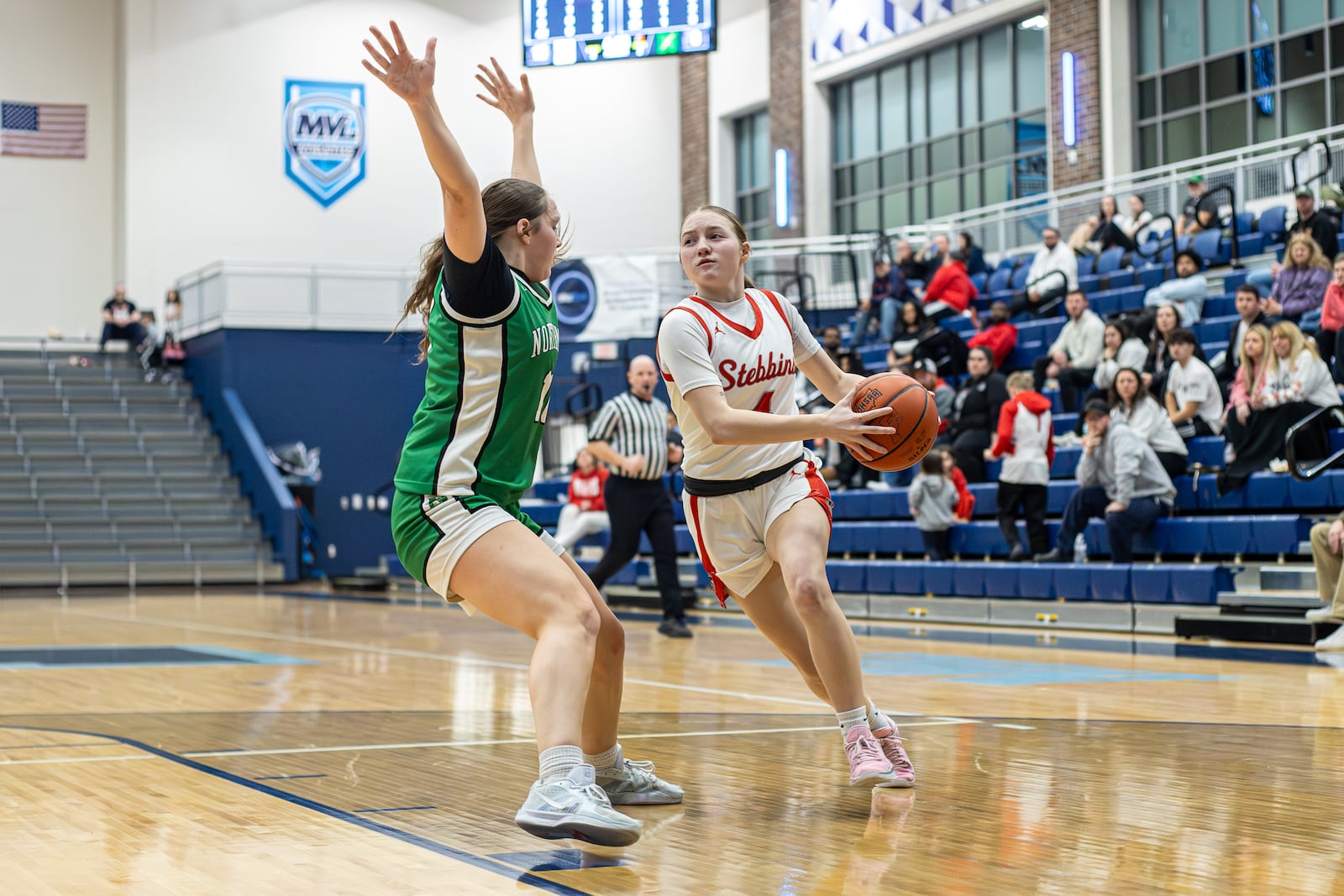 Stebbins High School junior Eva Maddix drives past Northmont sophomore Sophie Secor during their Division II district semifinal game on Wednesday, Feb. 25, 2026 at Fairborn's Skyhawk Arena. The Indians won 52-42. MICHAEL COOPER / STAFF