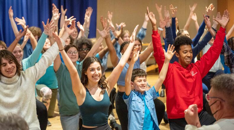 The company of Muse Machine's "The Little Mermaid" basks in the moment (Maggie Weckesser as Ariel, Noah Mullen as Flounder and Mason Melvin as Sebastian, pictured center left to right). PHOTO BY MATT SILVER