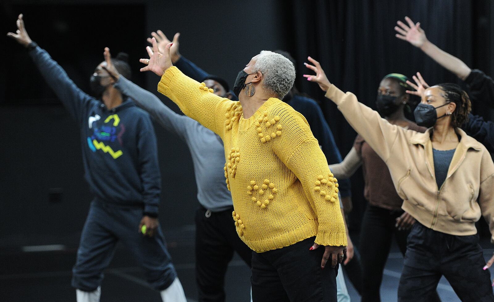 Dayton Contemporary Dance Company Chief Artistic and Producing Director Debbie Blunden-Diggs works with the company dancers Thursday Feb. 10, 2022. MARSHALL GORBY\STAFF