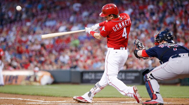 CINCINNATI, OH - SEPTEMBER 22: Scooter Gennett #4 of the Cincinnati Reds hits a grand slam home run in the first inning of an interleague game against the Boston Red Sox at Great American Ball Park on September 22, 2017 in Cincinnati, Ohio. (Photo by Joe Robbins/Getty Images)
