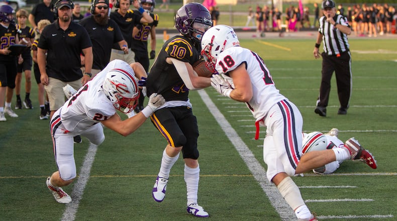 Tippecanoe hits Bellbrook's Vincent Epifano late out of bounds during Friday night's 21-7 Bellbrook win in Bellbrook. Jeff Gilbert/CONTRIBUTED