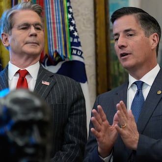 Rep. Bernie Moreno, R-Ohio, speaks during an event with President Donald Trump in the Oval Office of the White House, Monday, Feb. 2, 2026, in Washington, /as Treasury Secretary Scott Bessent listens. (AP Photo/Alex Brandon)