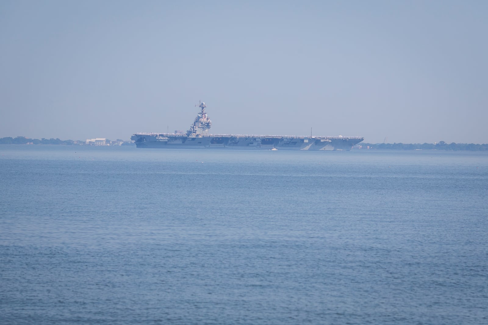 The USS Gerald R. Ford aircraft carrier leaves Naval Station Norfolk, Tuesday, June 24, 2025, in Norfolk, Va. (AP Photo/John Clark)