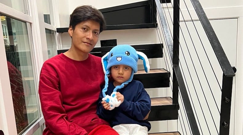 In this photo released by U.S. Rep. Joaquin Castro, D-TX, Adrian Conejo Arias and his son, five-year-old Liam Conejo Ramos are seen in San Antonio, Texas, Saturday, Jan. 31, 2026, after being released from Dilley detention center. (Joaquin Castro via AP)