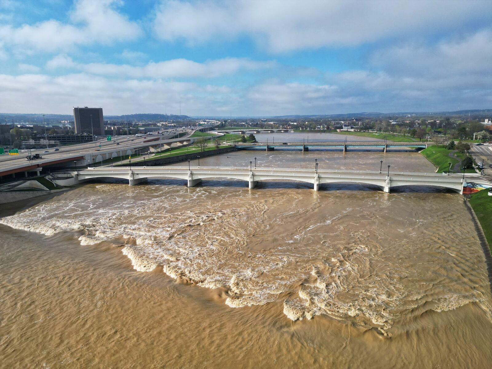 Water levels in the Great Miami River in Dayton are high. According to National Weather Service data, the river crested early Sunday at 33.24 feet. NICK GRAHAM/STAFF